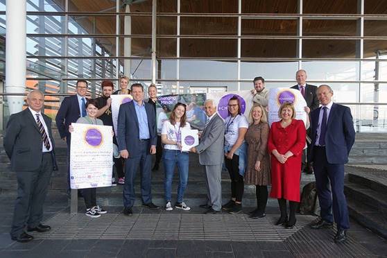 Petitioner handing in a petition to the Petitions Committee