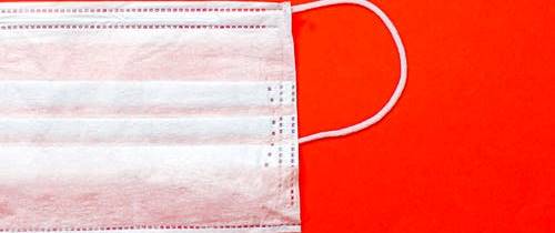 Face Mask on Red Background