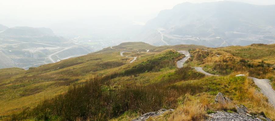 A picture containing mountain, outdoor, grass, sky

Description automatically generated