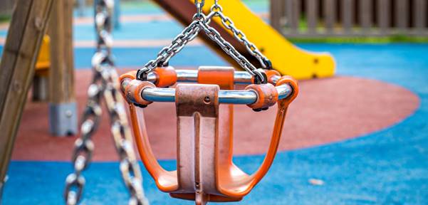 brown and black swing on blue and brown ground