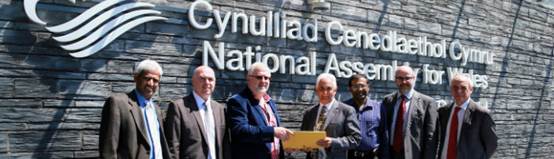 Petitioners handing over the petition to the Committee